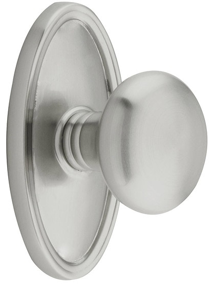 Oval Rosette Set With Providence Knobs in Satin Nickel.